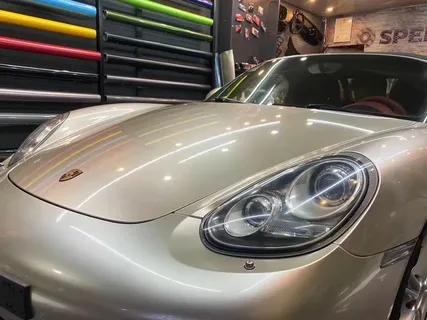 Glossy car paint finish under UAE sun highlighting heat and UV exposure