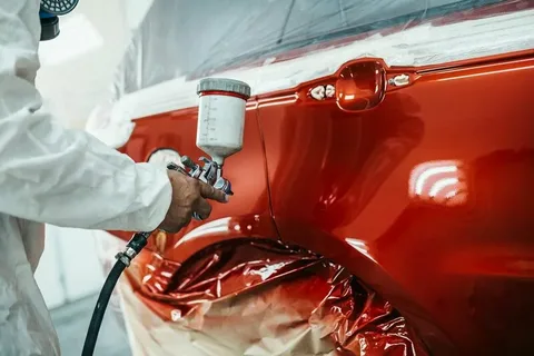 car paint tester used to inspect a used car before buying