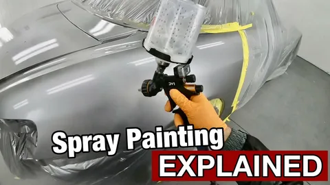 Professional paint job in spray booth demonstrating the paint side of car wrap vs paint debate